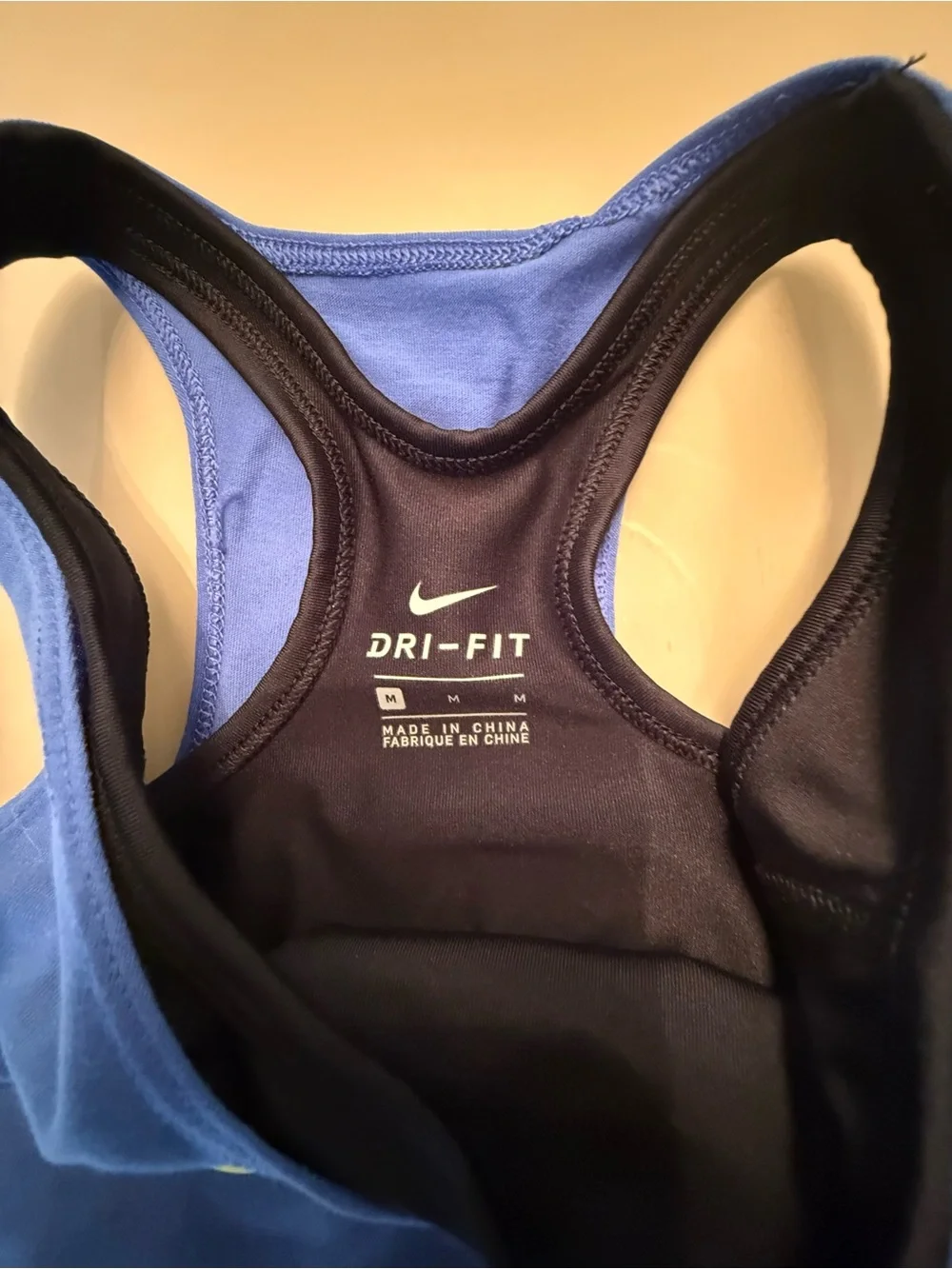 Nike Blue Racerback Tank with inner sports bra attached and Neon Yellow Swoosh